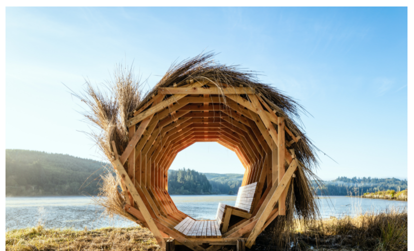 wooden structure by body of water